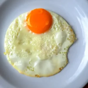 PORCION DE HUEVO FRITO