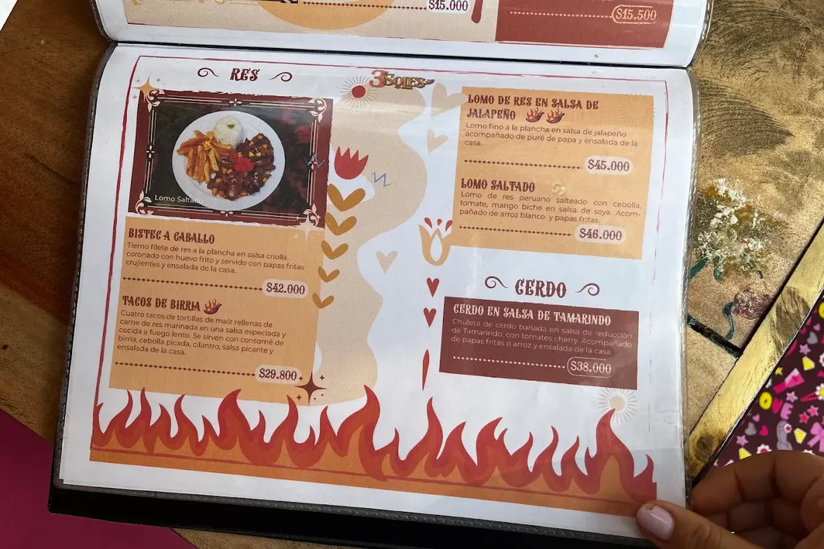 Carta del restaurante 3 Soles en Chía mostrando opciones del menú con carnes de res y cerdo.